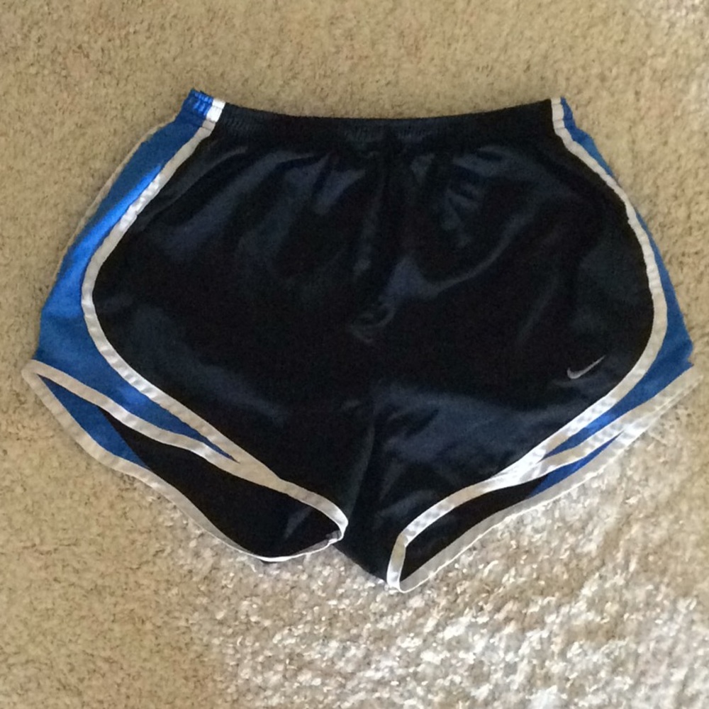 black Nike shorts with blue and white details